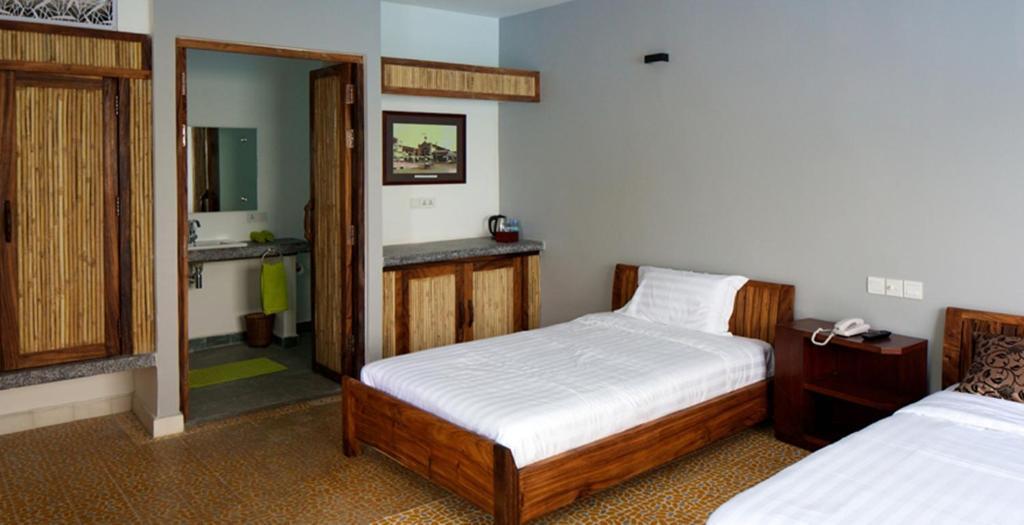 The Sangkum Hotel Phnom Penh Habitación foto